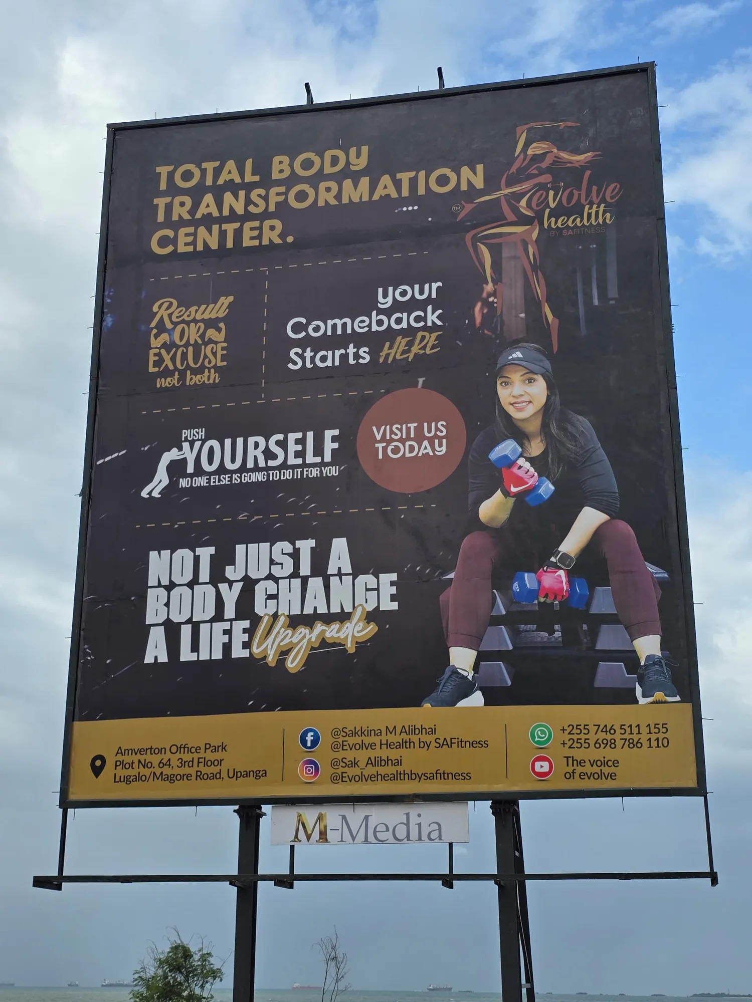 Portrait format billboard on a city road