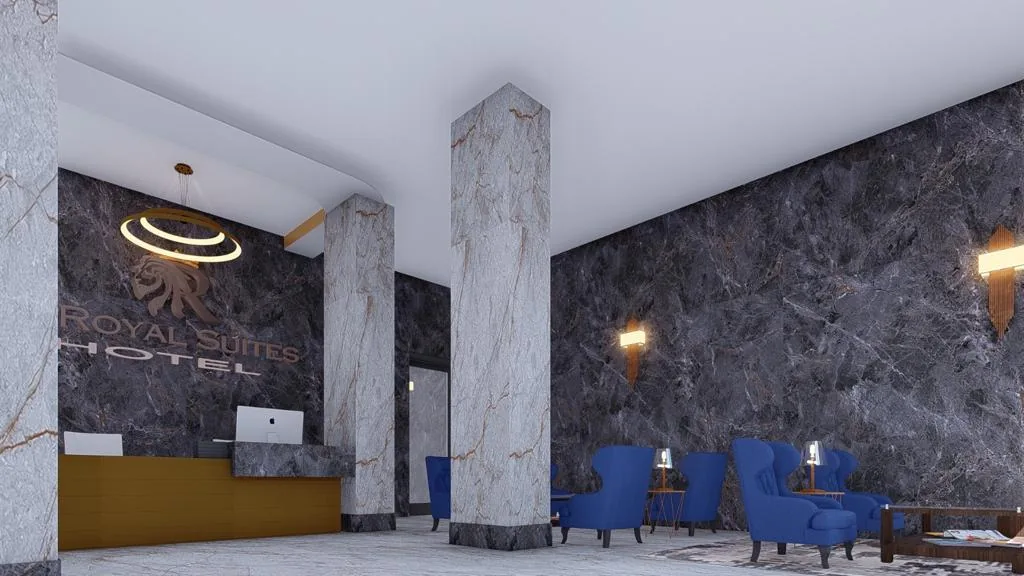 The Royal Suites Hotel lobby with marble finishes